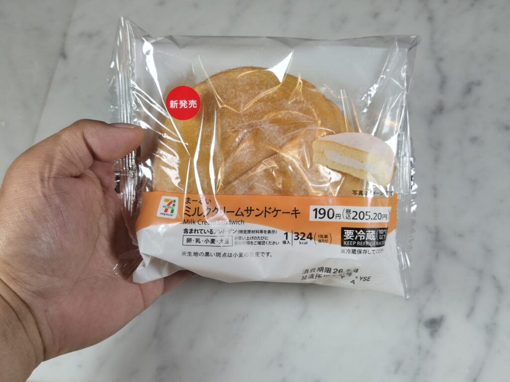 「まーるいミルククリームサンドケーキのパッケージ外観写真」